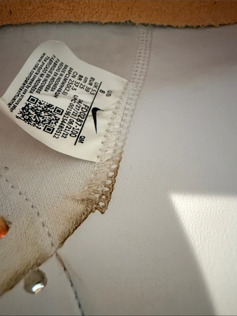 Nike White and Orange High-Top Sneakers